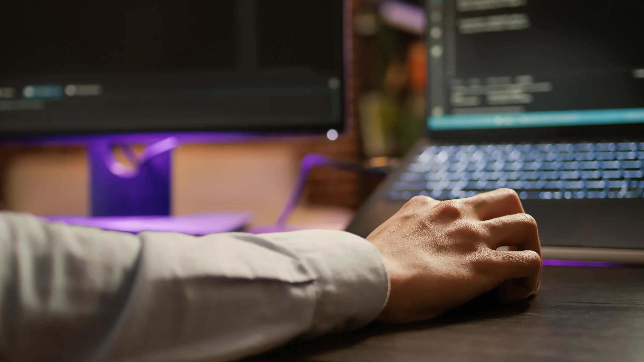 Man following the ATO crackdown through data matching programs on his computer