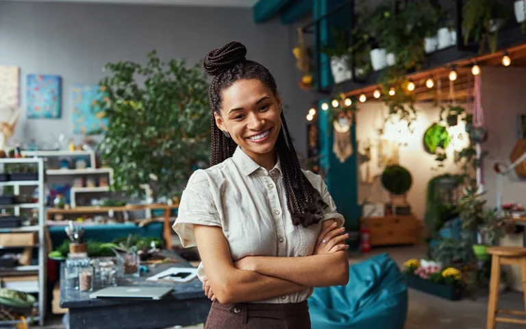 Image of a sole trader smiling at camera.