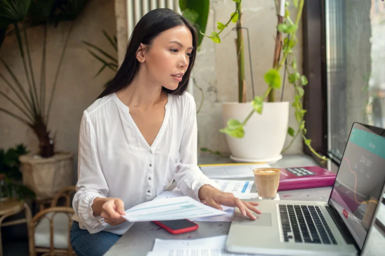 Business woman organising work-related deductions