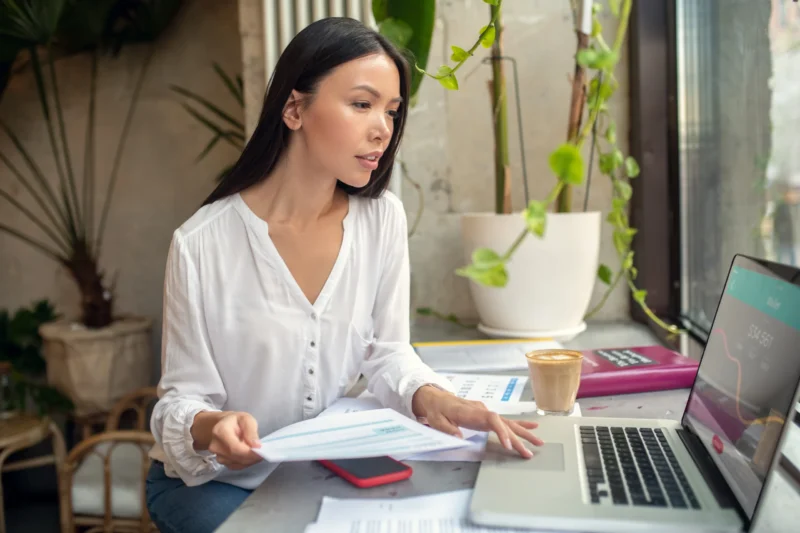 Business woman organising work-related deductions