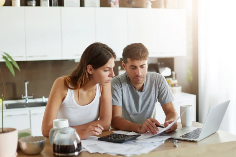 Couple looking at their financial software