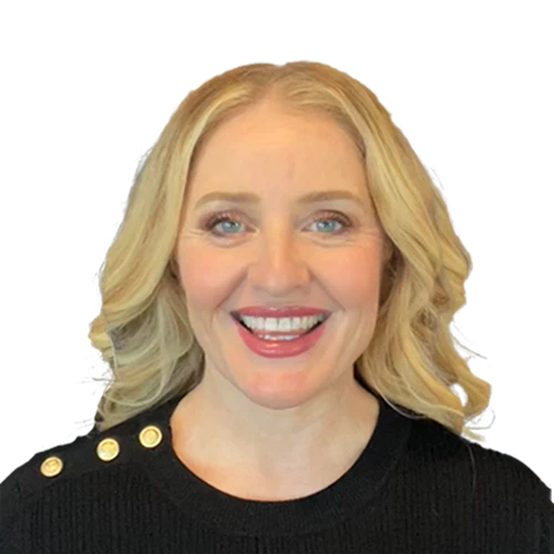 is wearing her blond hair down, is smiling at the camera and wearing a black blouse