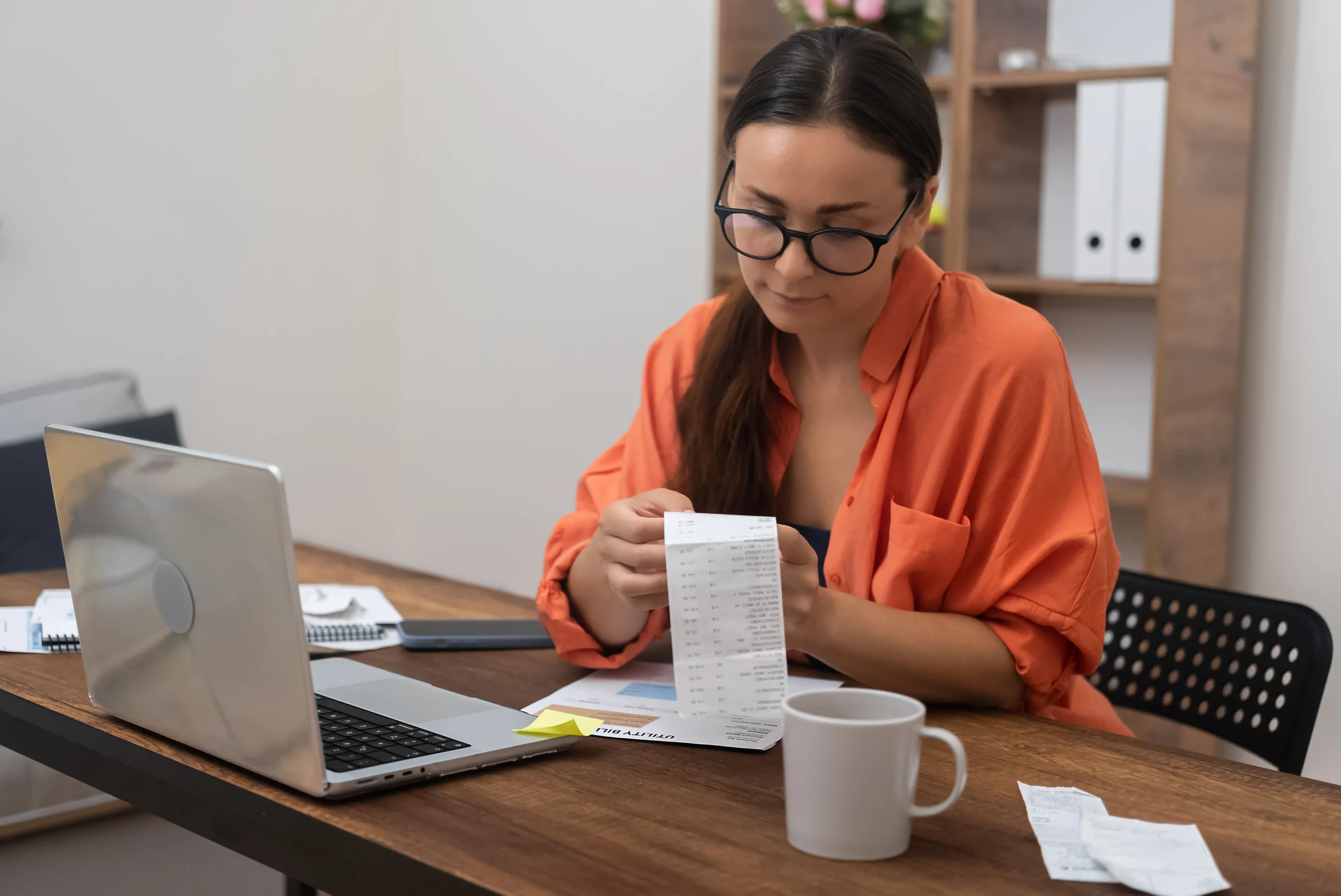 Woman going through receipts and tax planning