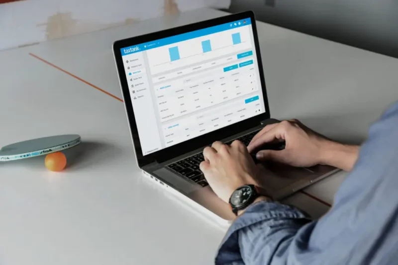 Man using tax software to manage his property investment