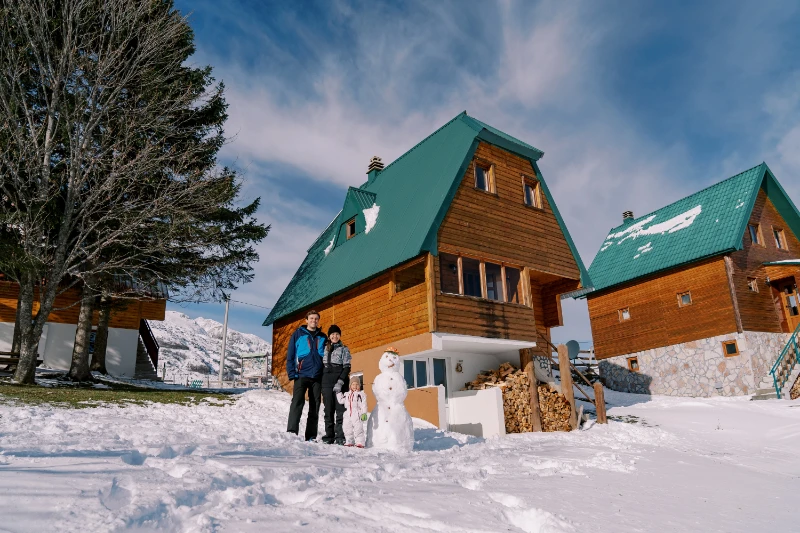 family enjoying ski lodge holiday home
