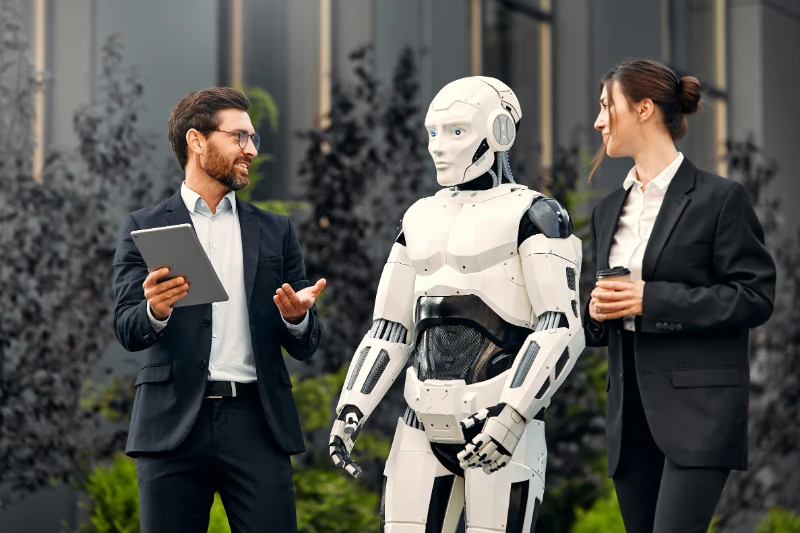 AI tax robot with 2 accountants standing outside